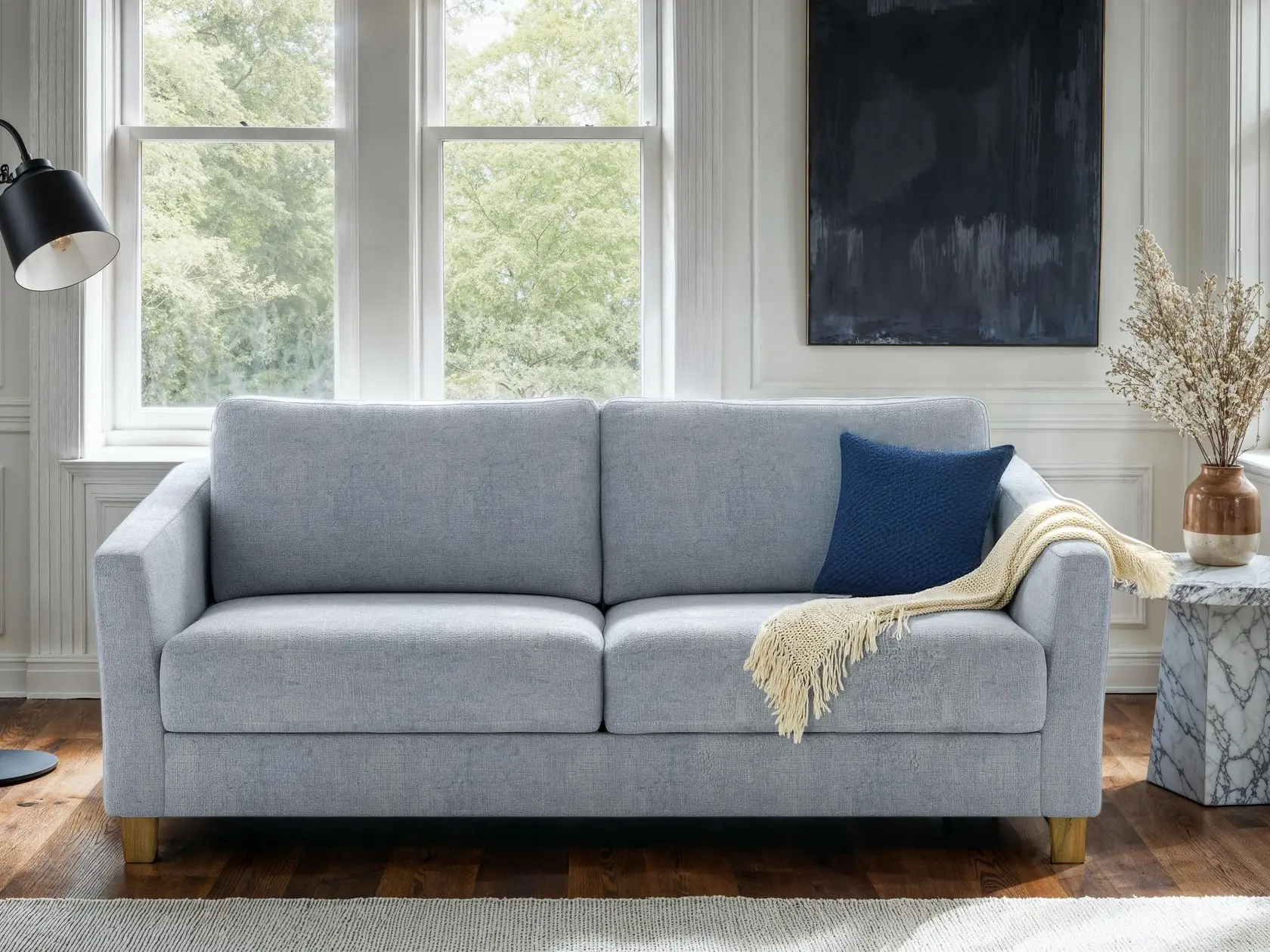Monika Sleeper Loveseat in Cerona 70 Luonto Monika modern sleeper sofa in light blue fabric with clean track arms and natural oak legs.